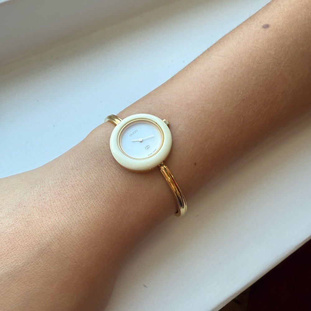 Gucci Gold and Cream Bangle Watch